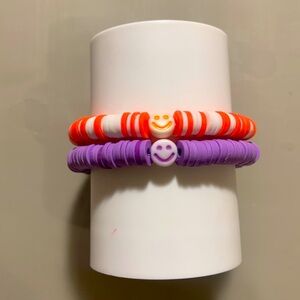 Two smiley face bracelets for any occasion